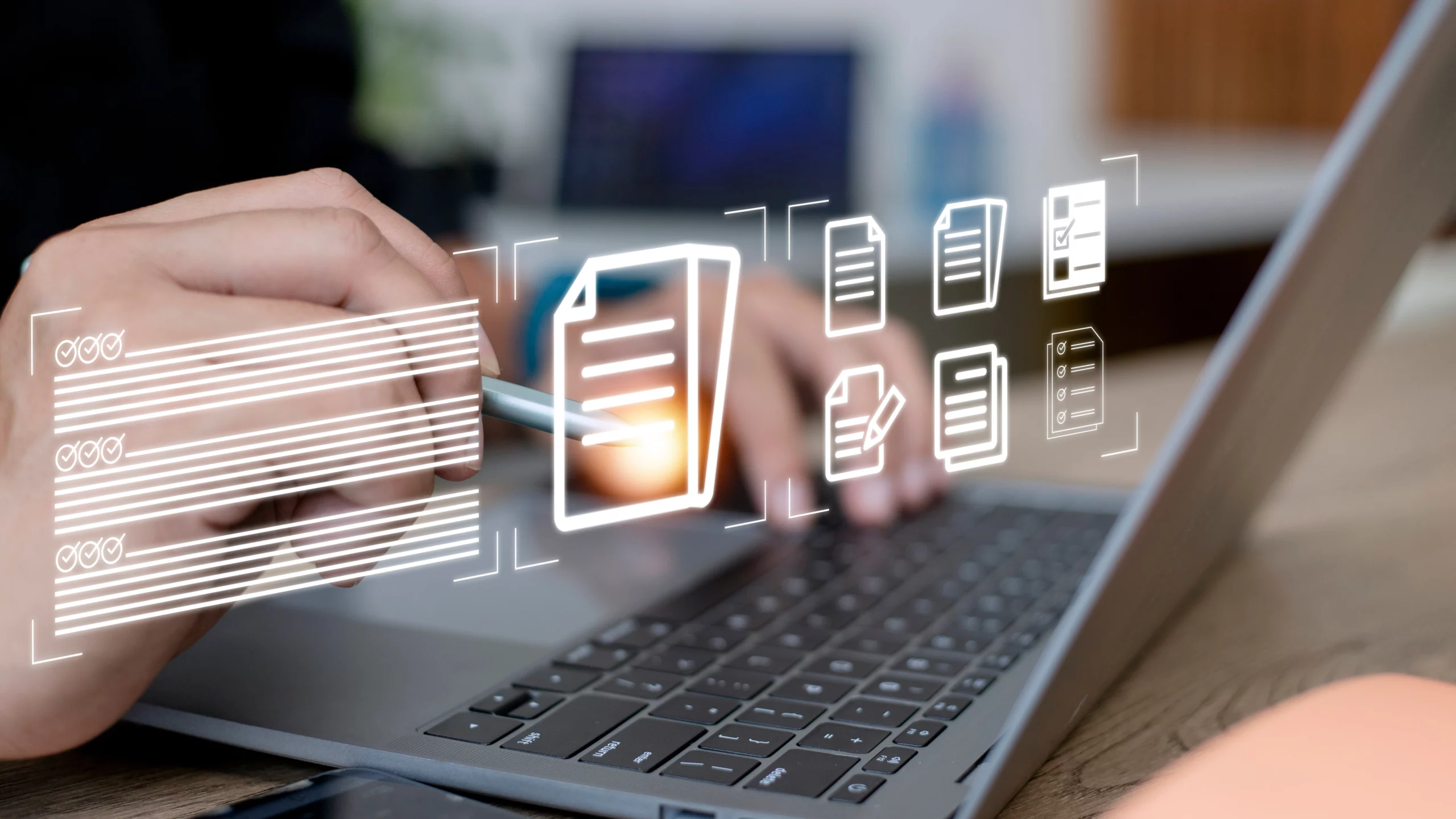Person interacting with virtual documents on a laptop, highlighting digital data management.
